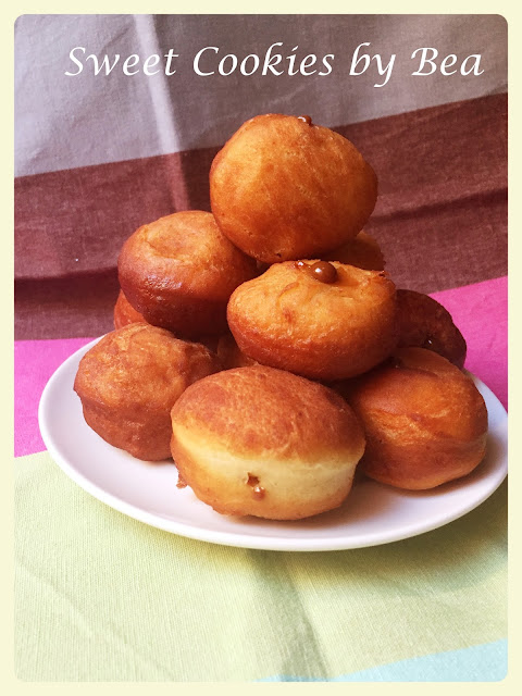 Bolitas de donuts rellenas de dulce de leche