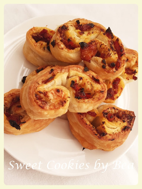 Palmeritas de tomates secos y queso